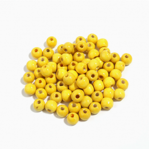 Bola de madera color amarillo de 6 -20mm Pake de 500kg