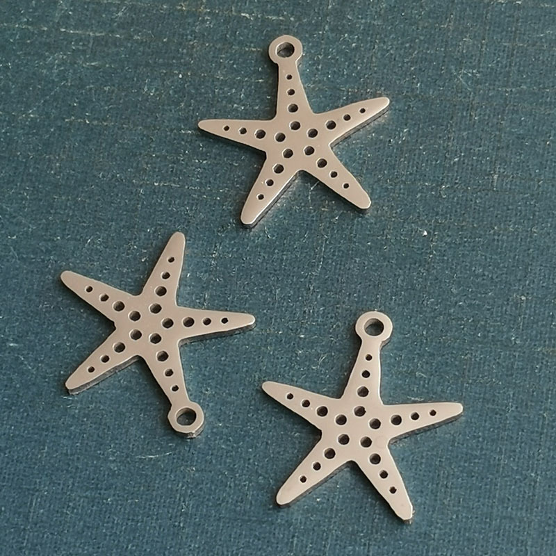 Colgante acero inoxidable estrella del mar plateado 36 Uds.