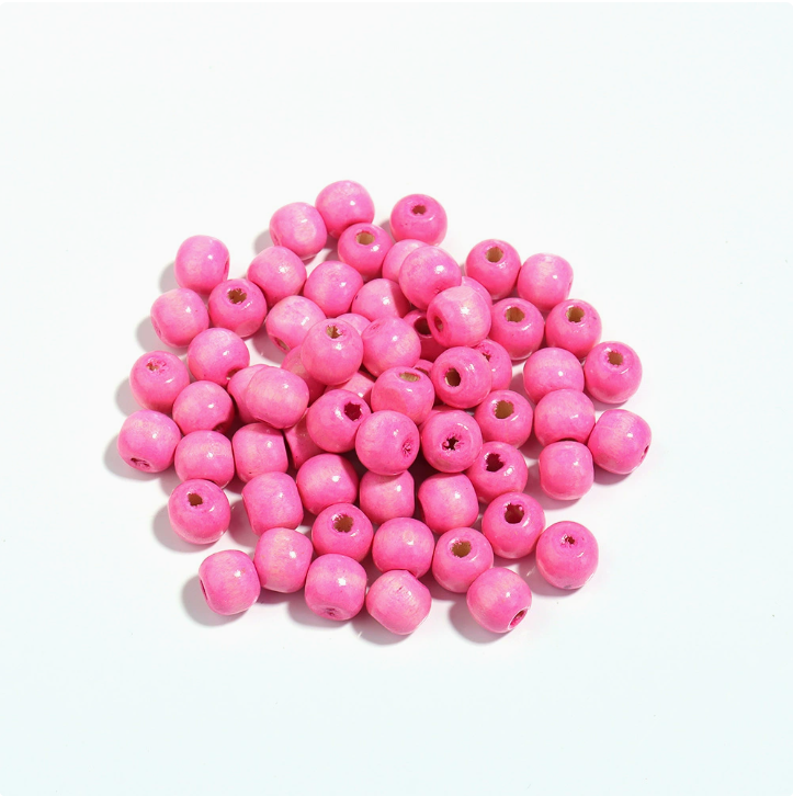 Bola de madera color rosado de 6 -20mm Pake de 500kg